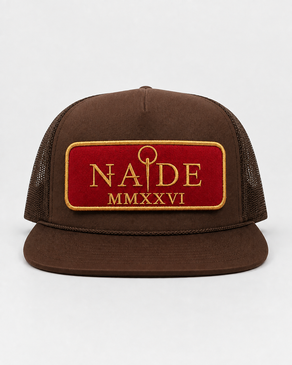 NADE brown trucker hat with red and gold embroidered patch