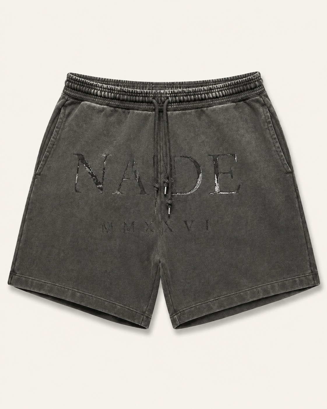 NADE MMXXVI Distressed Shorts — Charcoal product view on warm off-white background