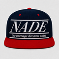 NADE navy blue snapback with red bill and enlarged white embroidered logo