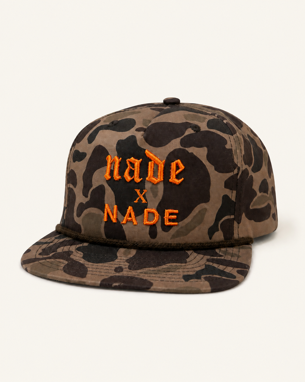 NADE x NADE Camo Snapback product view on warm off-white background